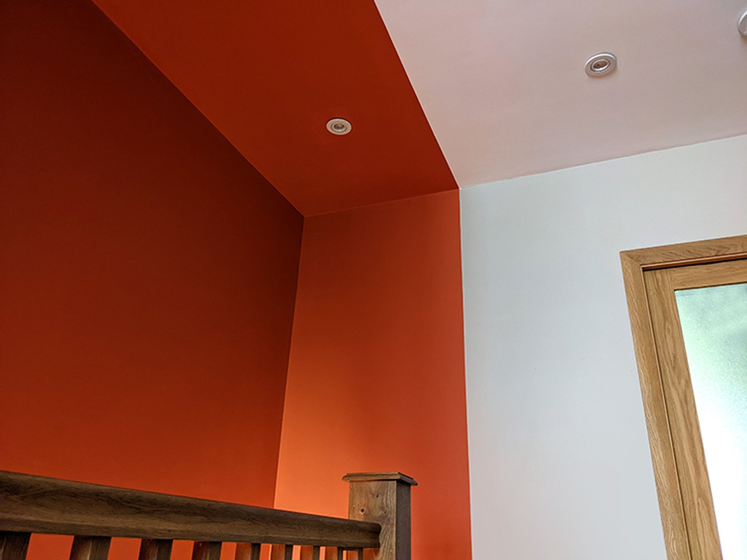 orange-staircaise-walls-interior-design-trends-2022-PGPstudio Wall and soffit of the hallway