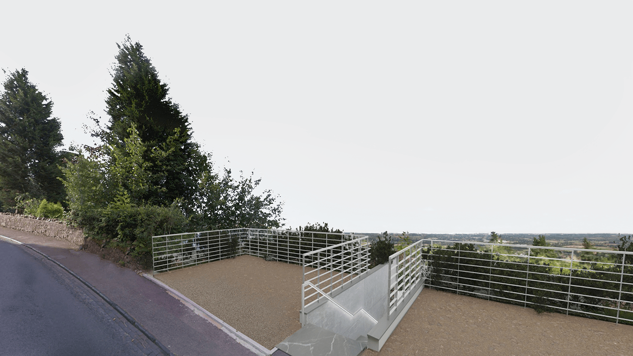 Entrance to the Stone House in between of the parking lot